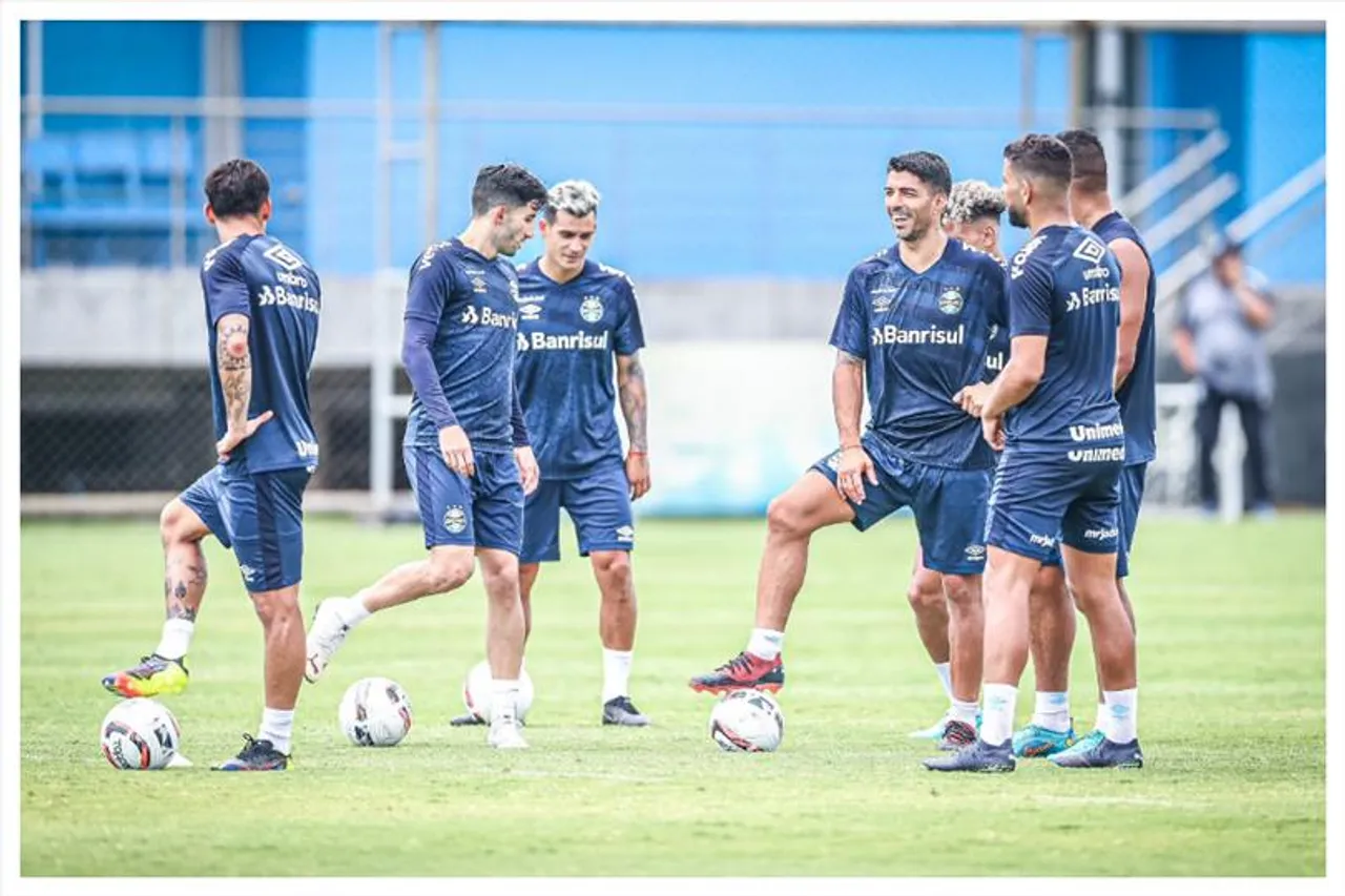 Luis Suarez shares practice moments with his new club