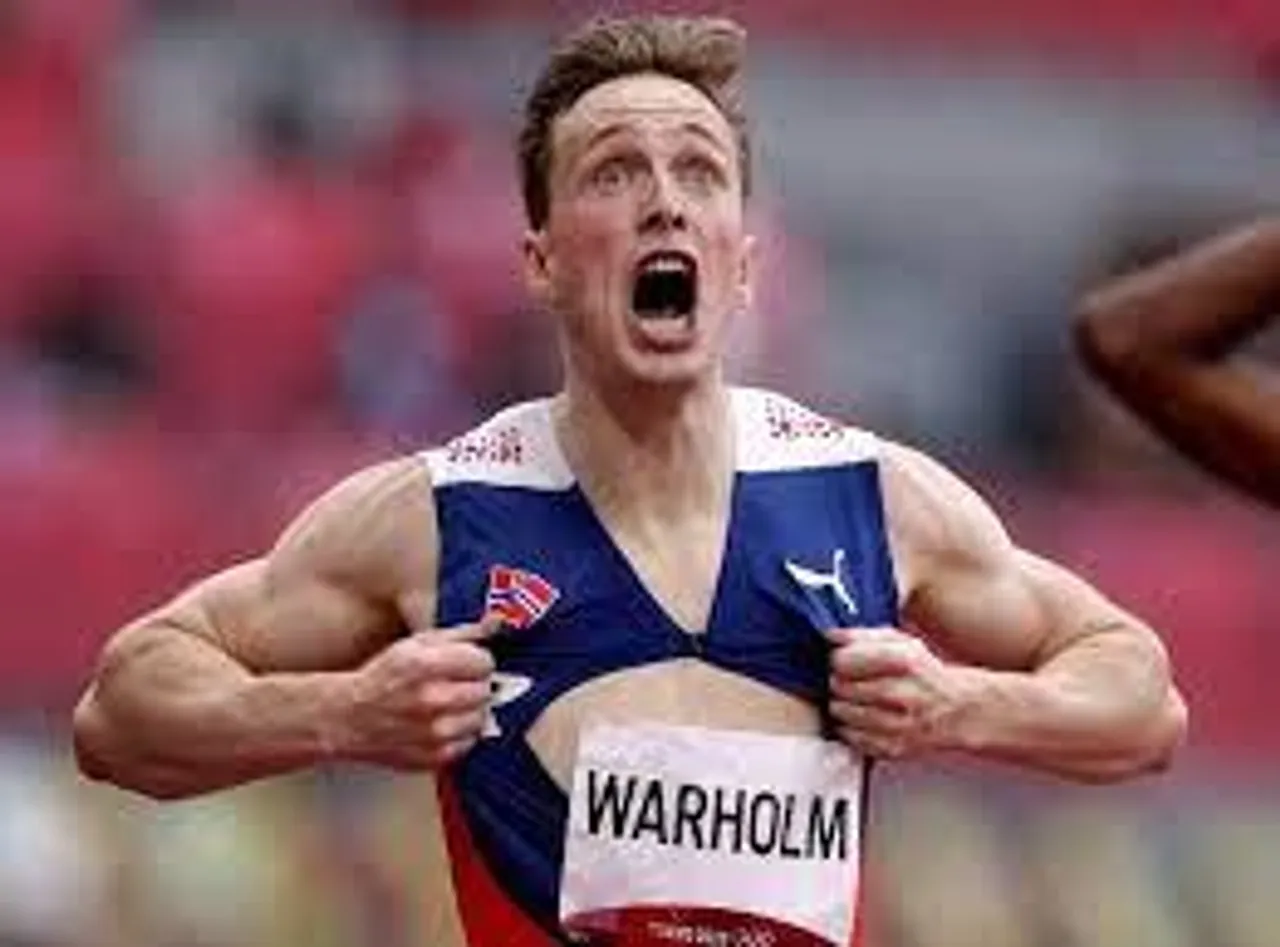 Norway's Karsten Warholm breaks world record to win gold in men's 400m hurdles