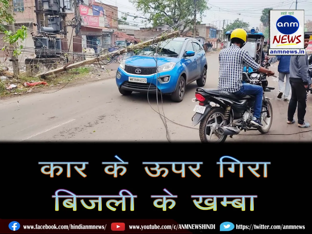 Electricity pole falls on car