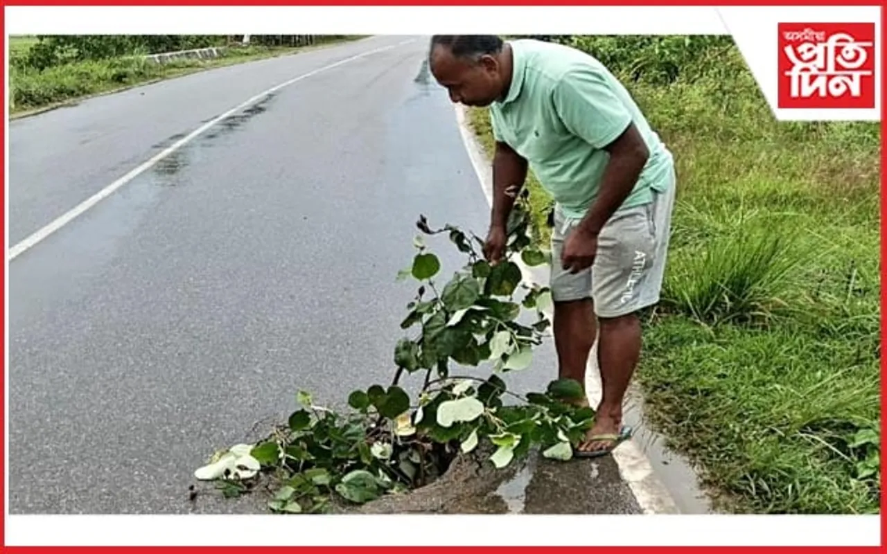 ঢকুৱাখনাৰ ঘাই পথৰ প্ৰকাণ্ড গাঁতে মাতিছে বিপদ...