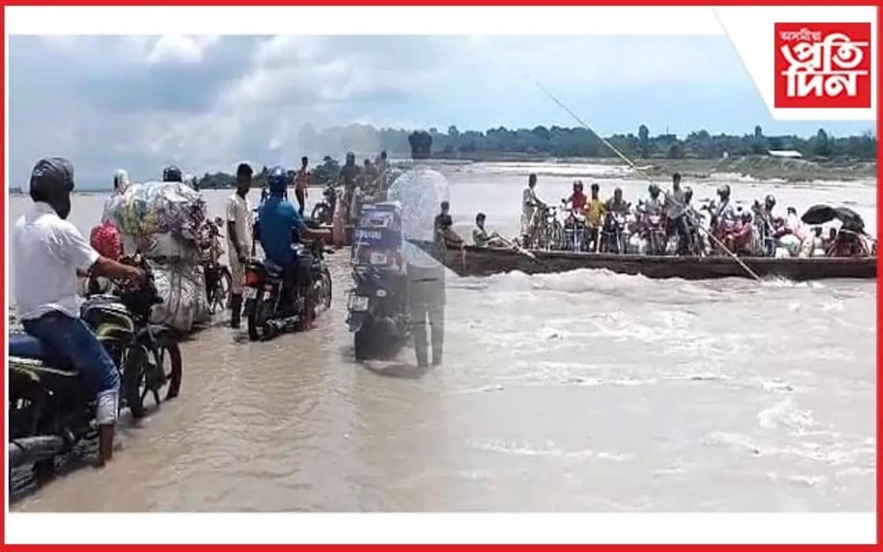 চিৰাঙত আই-নাঙলভাঙা নৈৰ বুকুত বিপদসংকুল নাও যাত্ৰা...