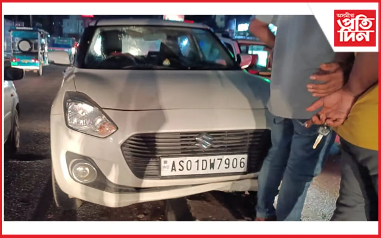 মহানগৰীৰ ৰাজপথৰ ডিভাইডাৰত উঠিল বাহন