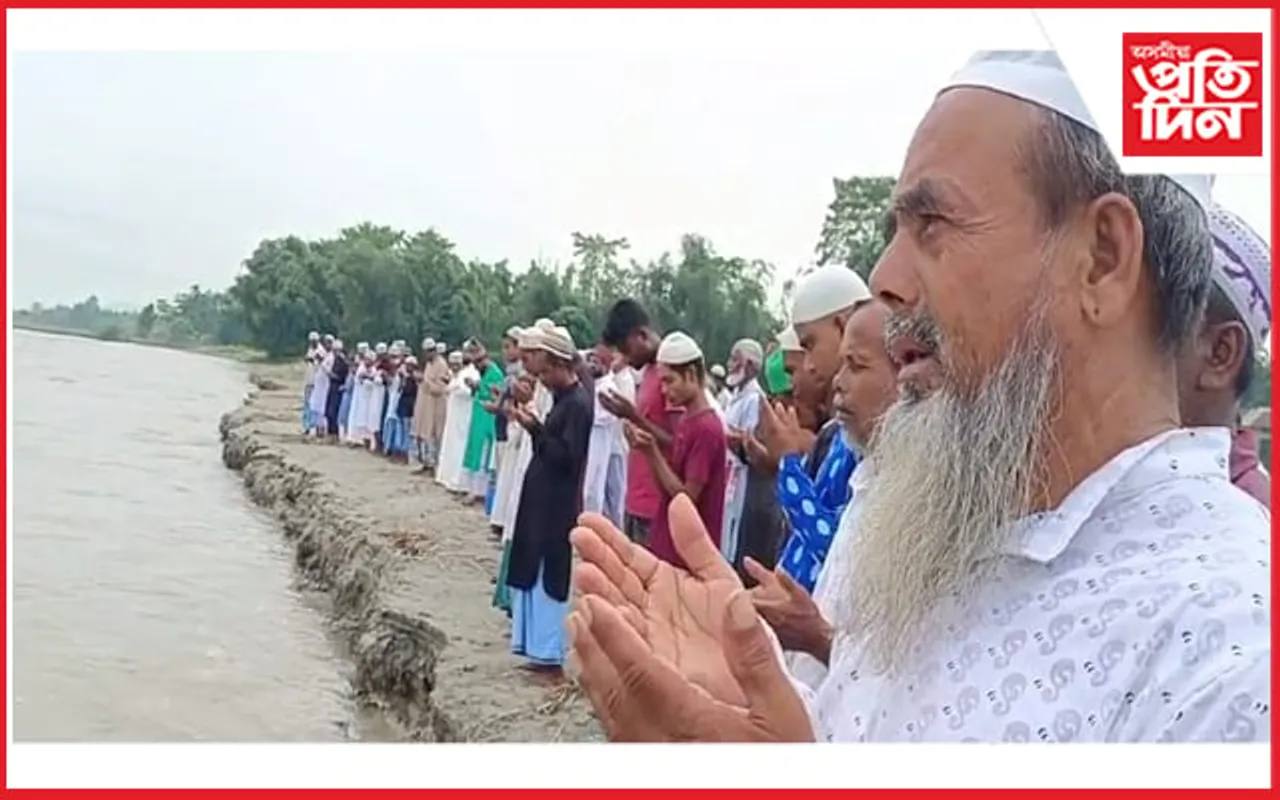 আই নৈৰ বানপানী-খহনীয়াৰ পৰা ৰক্ষা কৰিবলৈ নৈৰ পাৰত ৰাজহুৱা প্ৰাৰ্থনা