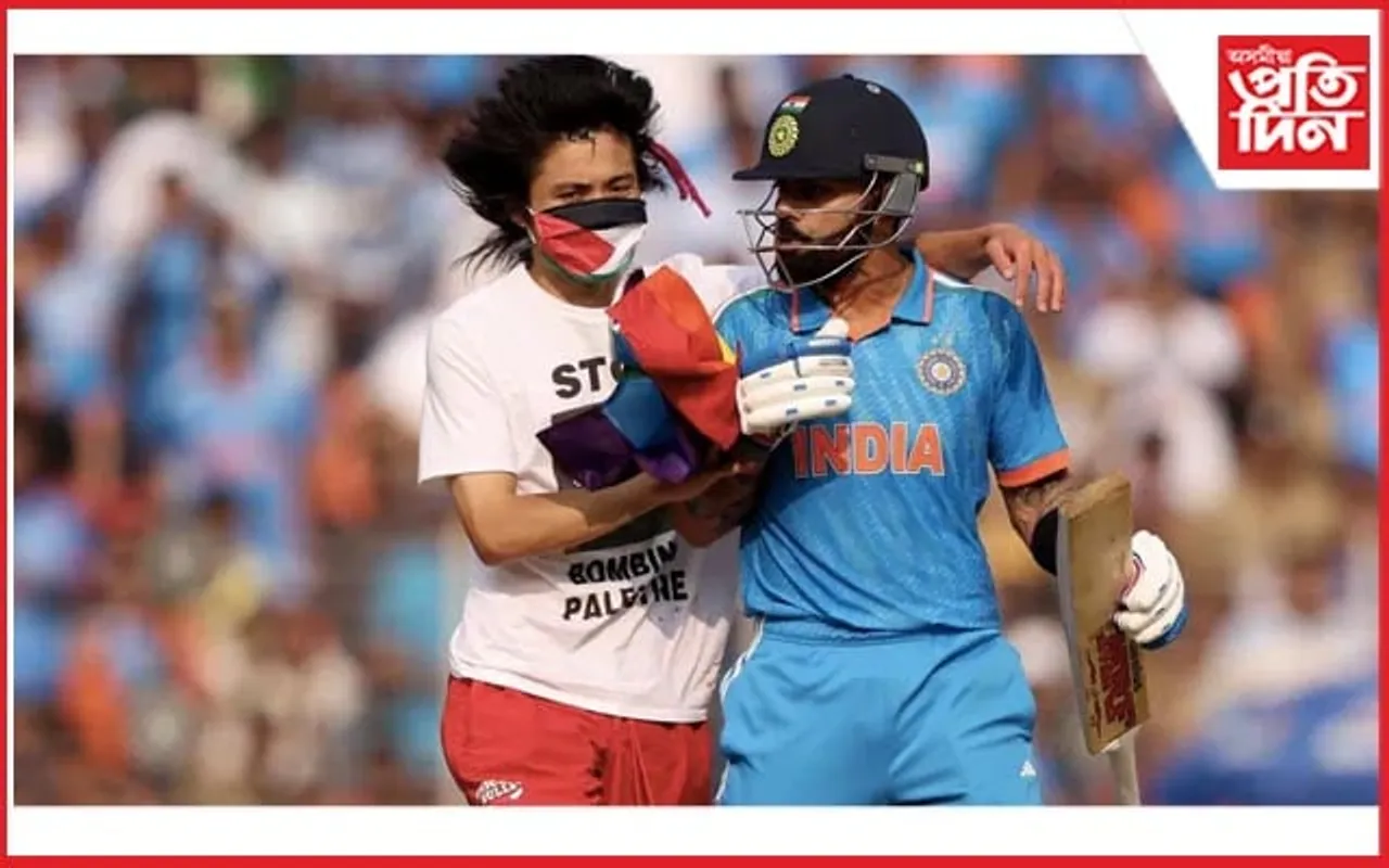 'ফ্ৰী পেলেষ্টাইন' লিখা টি-চাৰ্ট পিন্ধি খেলপথাৰত প্ৰৱেশ অনুৰাগীৰ, সাৱটি ধৰিলে কোহলিক