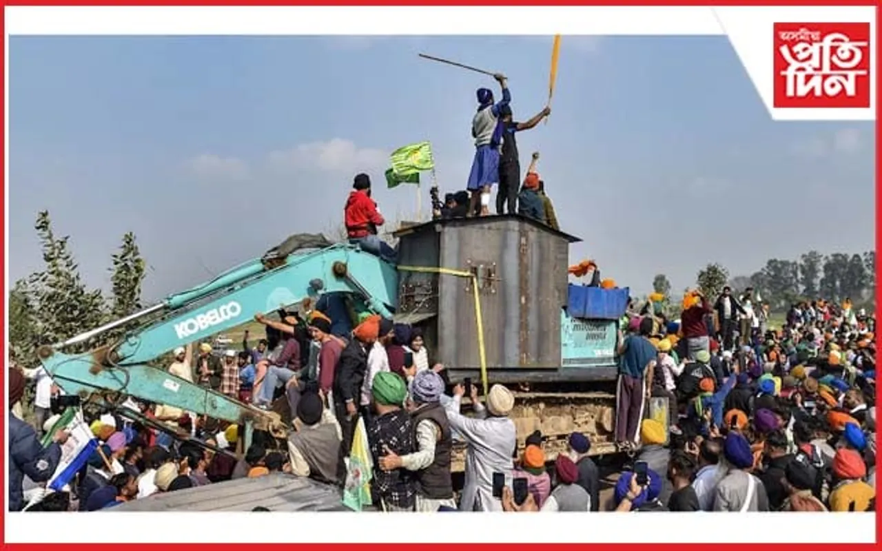 অধিক উগ্ৰ হৈছে প্ৰতিবাদী কৃষকঃ জেচিবি লৈ ভাঙিবলৈ সাজু আৰক্ষীৰ বেৰিকেড...