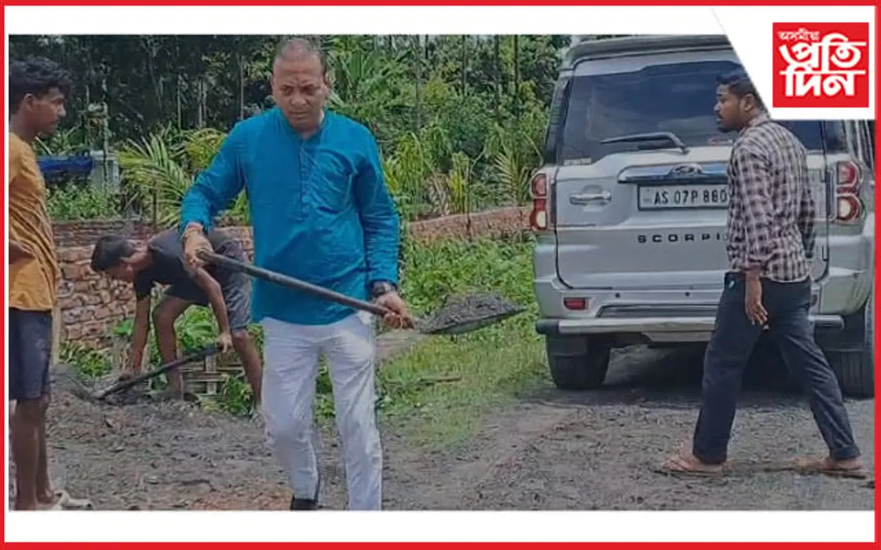 ৰজাঘৰীয়াক কাকূতি-মিনতি কৰিও নাপালে ফল ! পথ-মেৰামতিৰ কামত নামিল বিজেপি নেতা