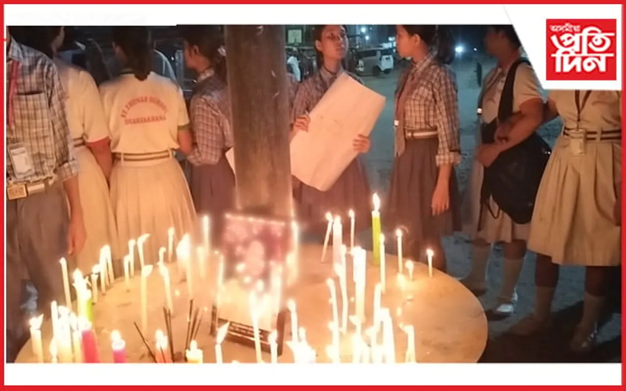 মহিলা চিকিৎসকৰ হত্যাকাৰীক ফাঁচিৰ দাবীৰে চেইণ্ট থমাছ স্কুলৰ শিক্ষাৰ্থীৰ বন্তি প্ৰজ্বলন
