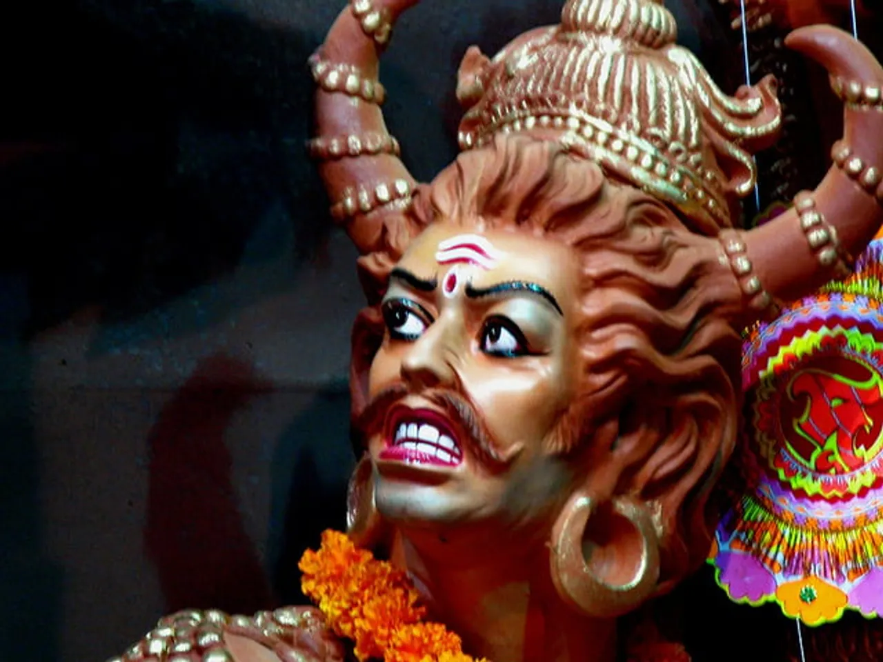 ভক্তিমূলক গান বজাবি কিয়? পূজাৰ মণ্ডপত মহিষাসুৰৰ খং, প্ৰাণ ল’লে যুৱকৰ