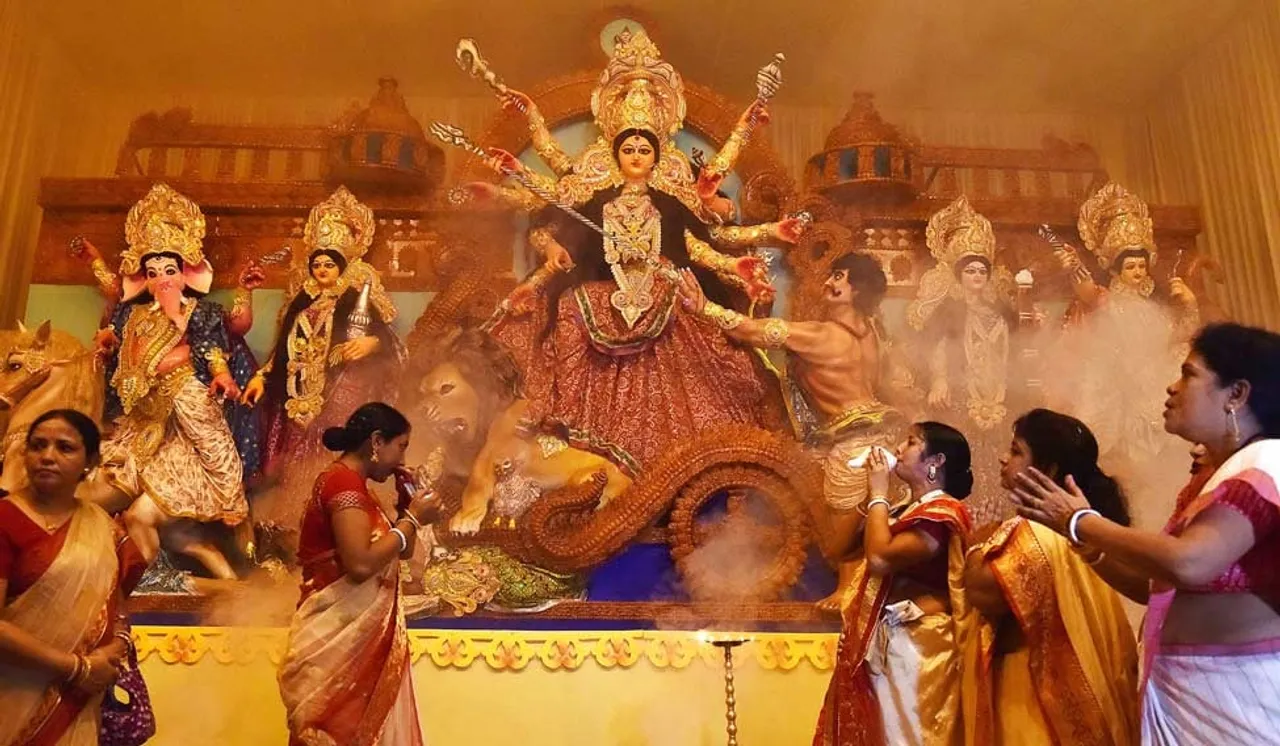 আজি ষষ্ঠী, বেদীত স্থাপিত হ'ব মা দুৰ্গাৰ প্ৰতিমা...