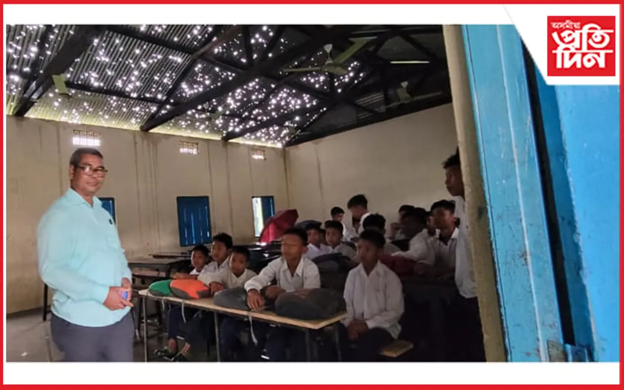 সন্মুখত গুণোৎসৱ: শ্ৰেণীকোঠাত ছাতি লৈ ছাত্ৰ-ছাত্ৰীৰ অধ্যয়ন…