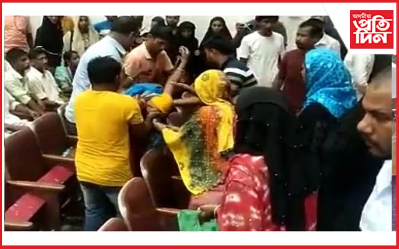 উৎকট গৰম!  মন্ত্ৰী লৈ ৰৈ ৰৈ অচেতন হৈ মজিয়াত বাগৰি পৰিল মহিলা