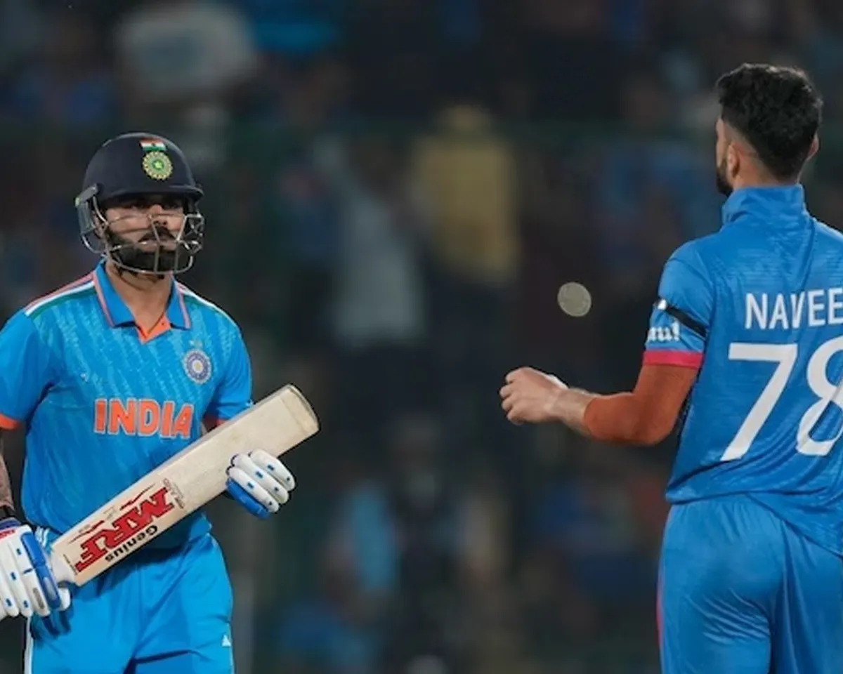 Virat Kohli and Naveen-ul-Haq (Source : Twitter)