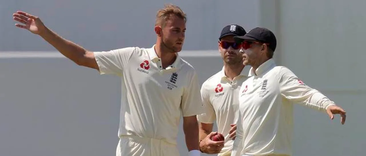 Joe Root with James Anderson and Stuart Broad