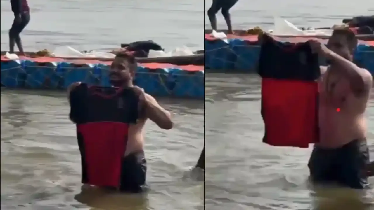 RCB fan dips jersey at Maha Kumbh
