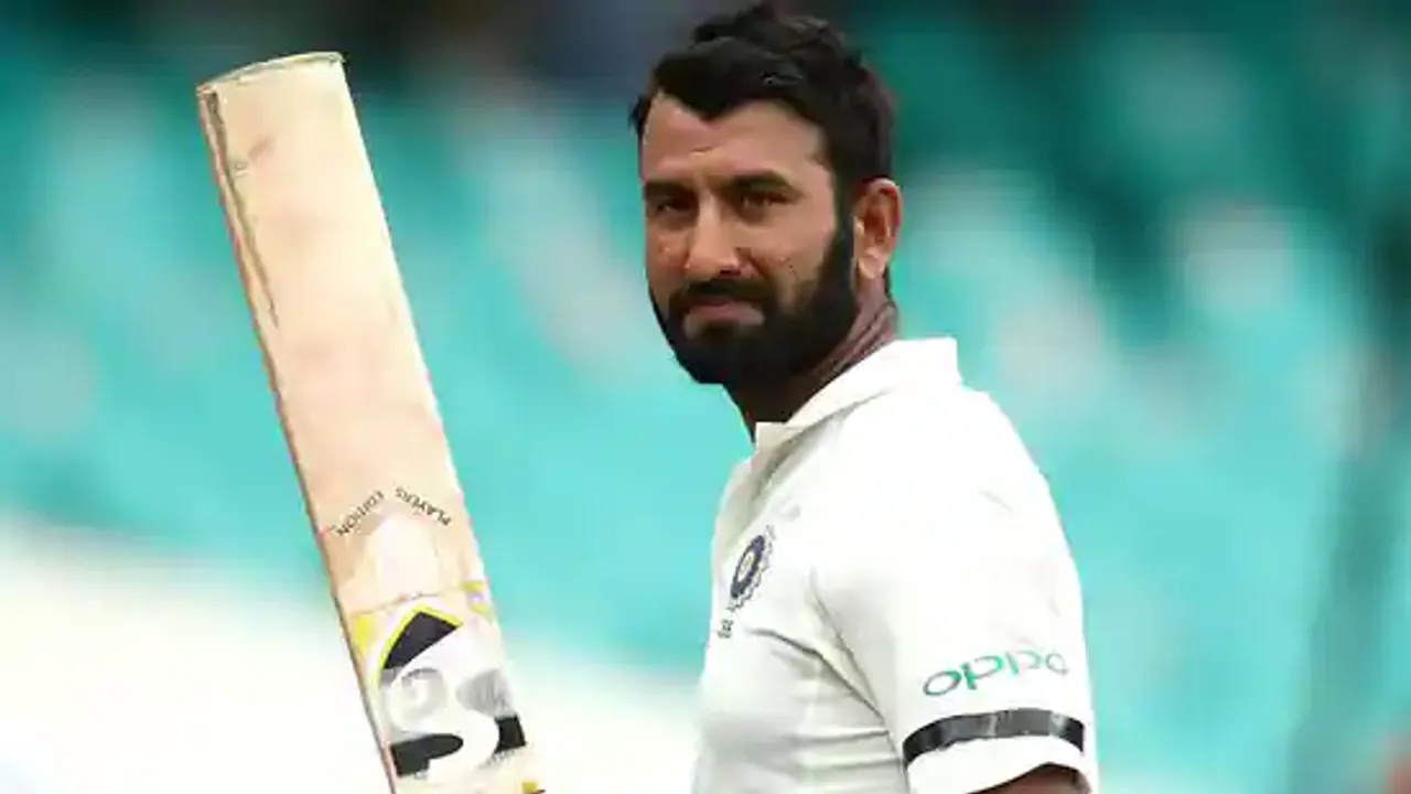 pujara-raises-bat-getty_1622370255759_1756020509989 (1)