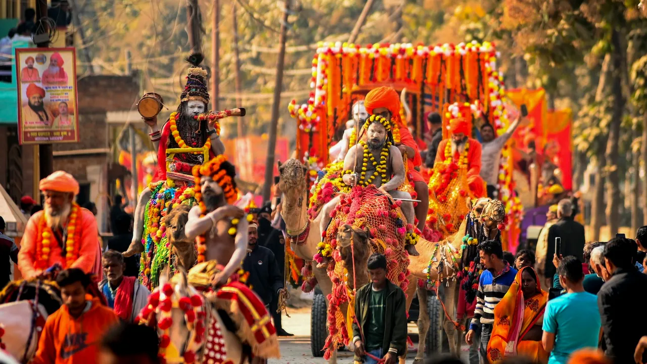 Naga sadhus of 'Panch Dashnam Avahan Akhara' take part in a religious procession called 'Peshwai', to reach the Mahakumbh ahead of Maha Kumbh Mela 2025 in Prayagraj on Sunday, Dec. 22, 2024.