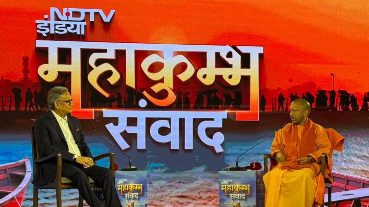 NDTV Editor-in-Chief Sanjay Pugalia with CM Yogi Adityanath at the NDTV India Mahakumbh Samvaad event