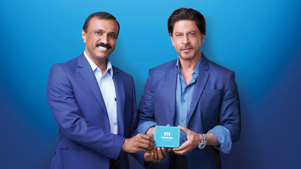 Shaji Varghese CEO of Muthoot FinCorp Limited with Shah Rukh Khan