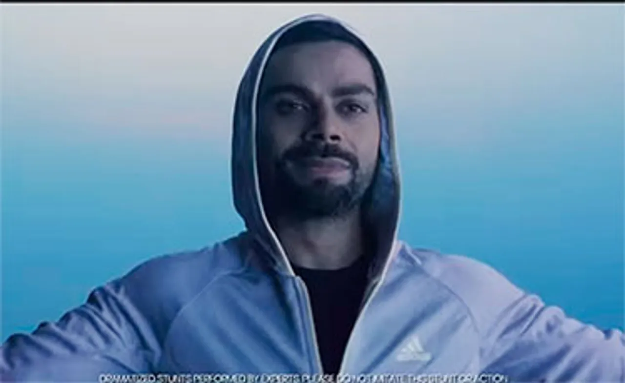 Virat Kohli sprints through a world driven by duality for Adidas