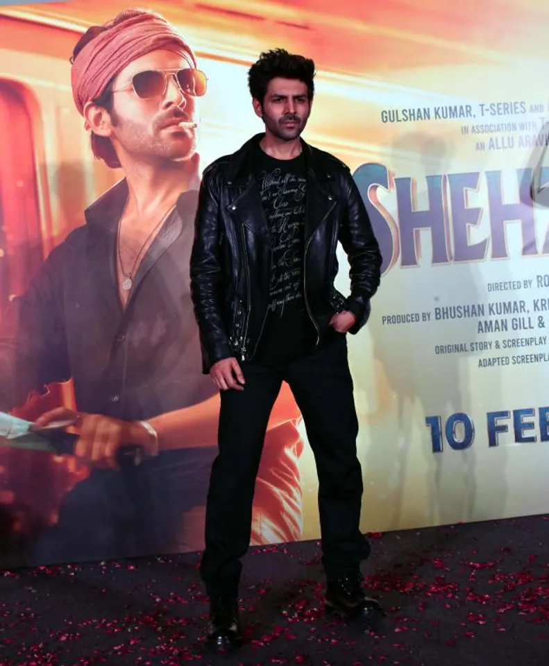Actors Kartik Aaryan, Kriti Sanon with filmmakers Bhushan Kumar,Allu Aravind, Aman Gill and Director Rohit Dhawan poses during trailer launch of their upcoming film Shehzada in Mumbai on Thursday.