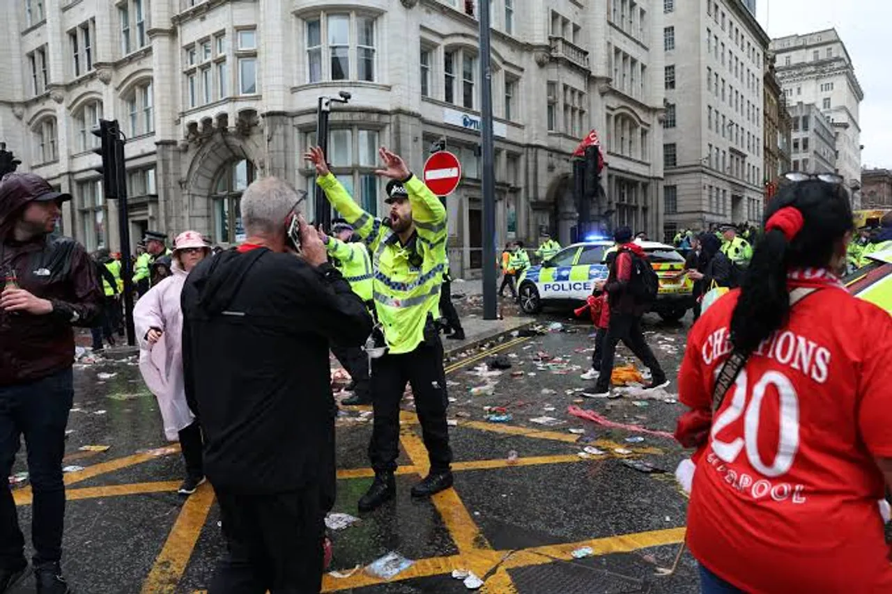 50 injured as car crashes into victory parade of Liverpool football fans