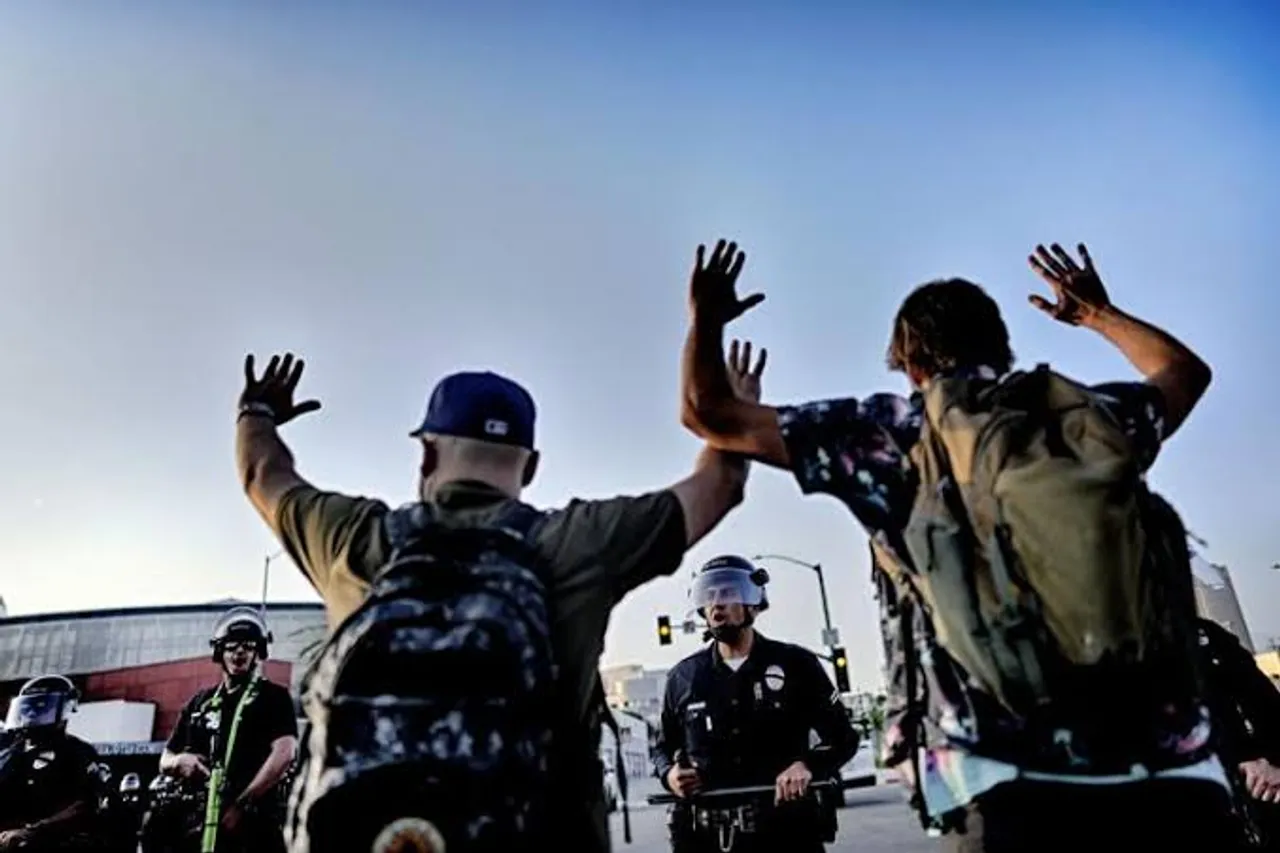 Los Angeles mayor imposes overnight curfew on downtown as protests spread