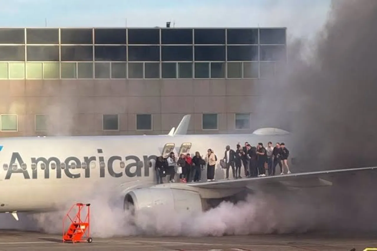 Passengers evacuated after American Airlines plane catches fire at Denver Airport