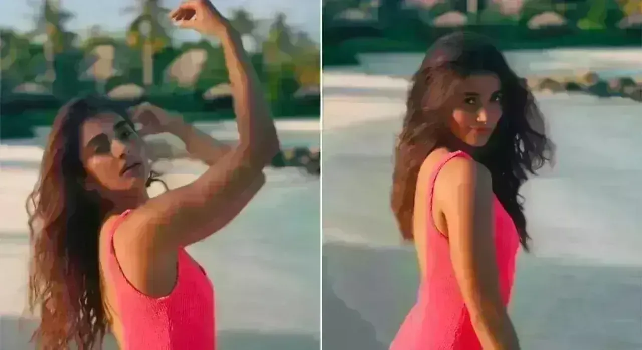 In a neon pink swimsuit, Pooja Hegde is taking Barbiecore Fashion to the beaches of Maldives