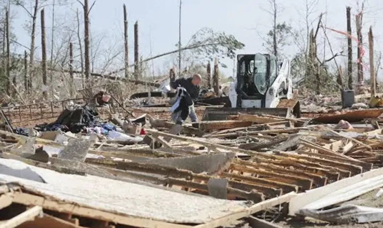 At least 26 dead after tornadoes rake US Midwest, South