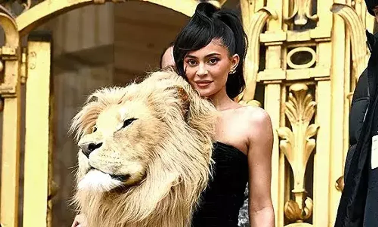 Kylie Jenner wears huge lion head gown to Paris fashion week