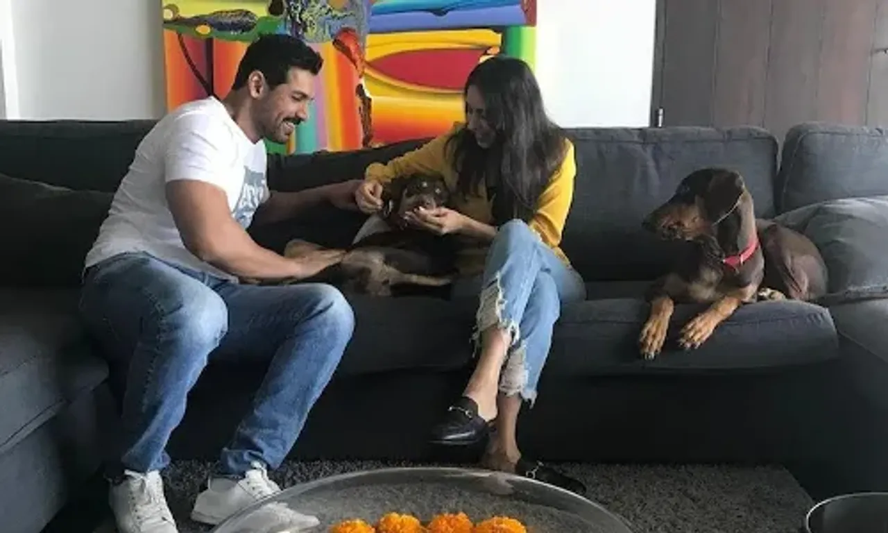 On his 49th birthday, John Abraham shares adorable photos with his wife Priya and their dogs