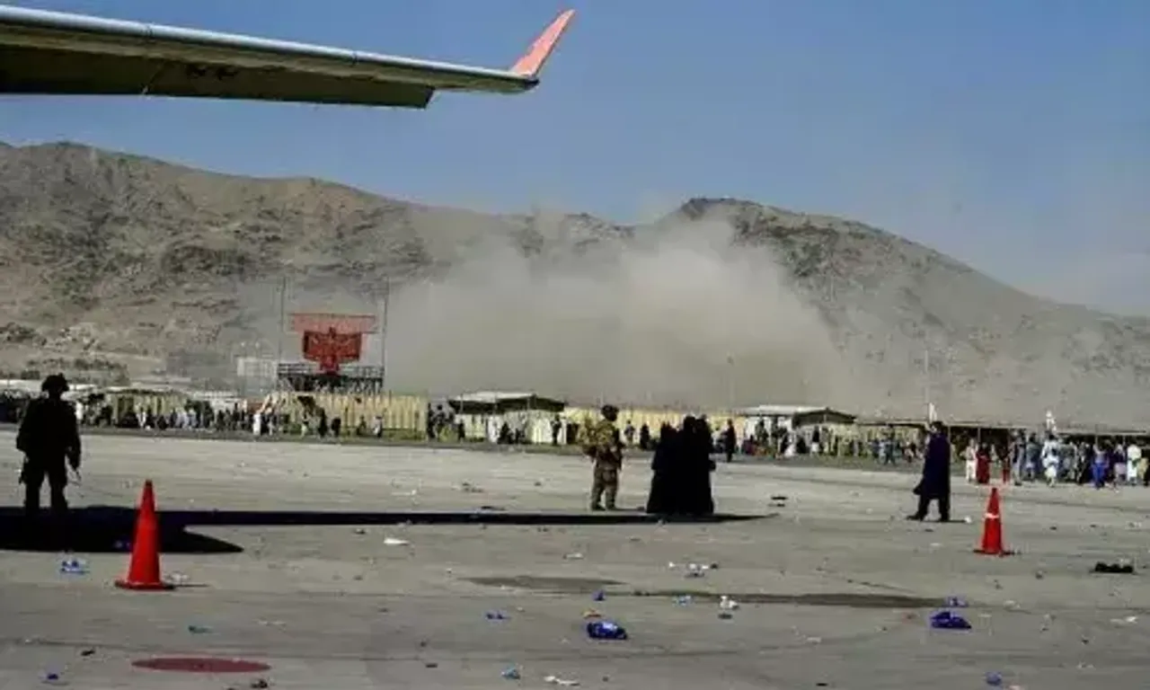 At least 60 civilians and 13 US troops killed in suicide attacks outside Kabul airport in Afghanistan