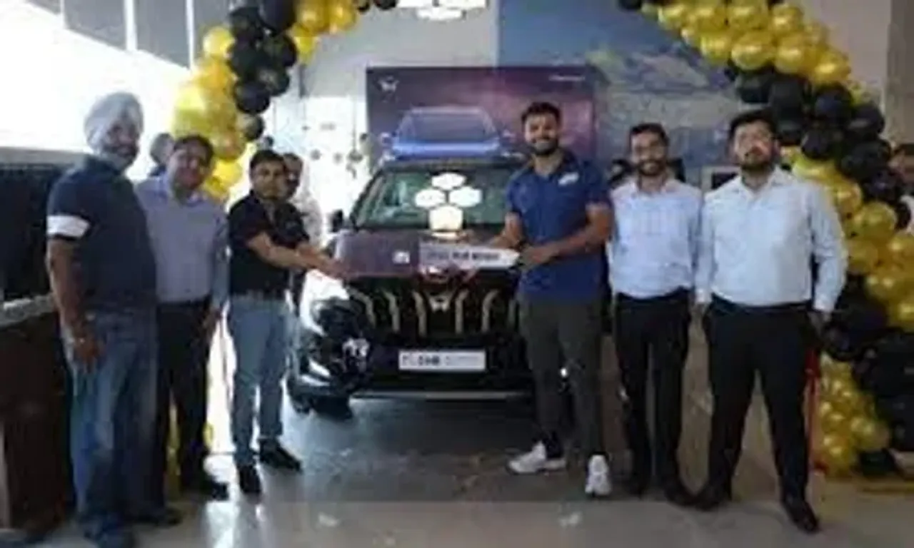 Sumit Antil, a paralympian, receives the Mahindra XUV700 Javelin Gold Edition
