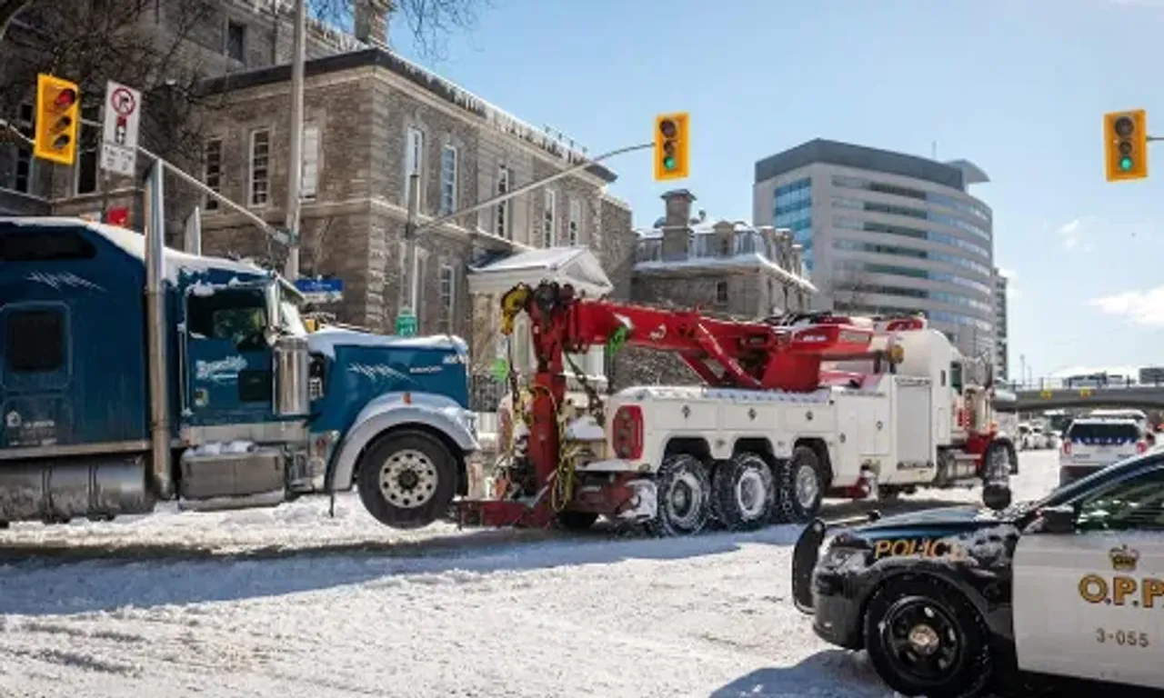 100 protesters from 'Freedom Convoy' arrested, as Canadian police begin crackdown