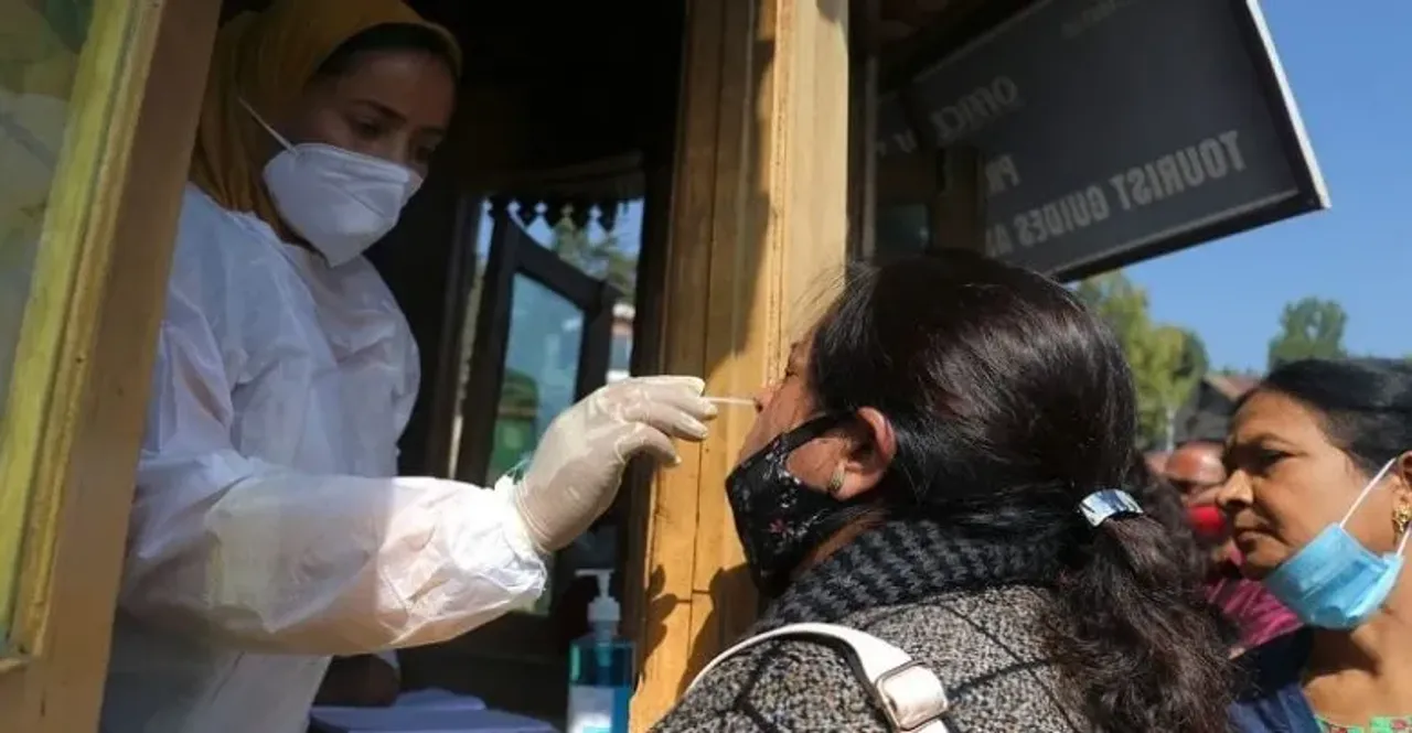 India records 8,318 new COVID-19 cases
