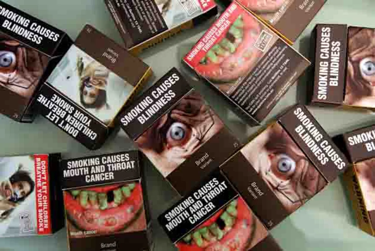 Display of health warning on tobacco packets reduced to 50%