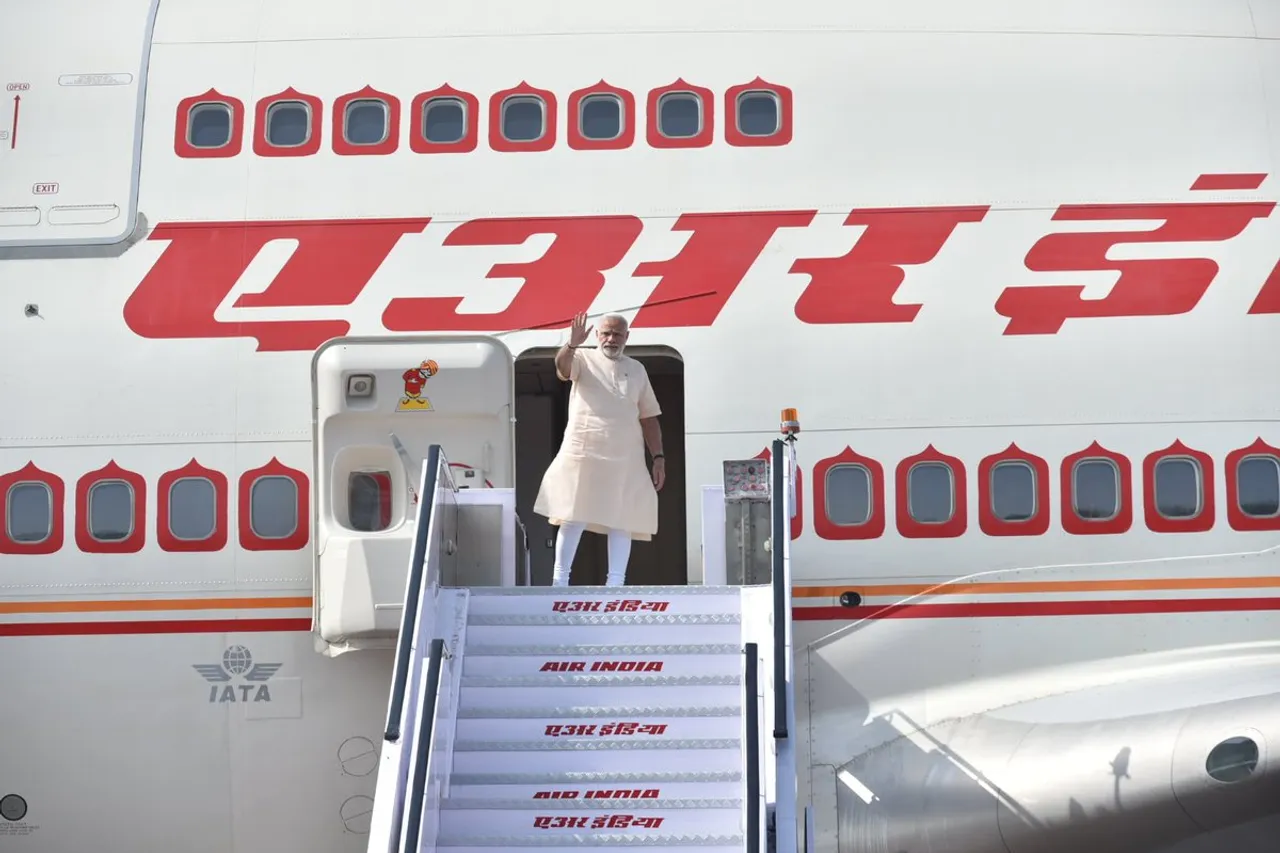 Narendra Modi leaves for Laos