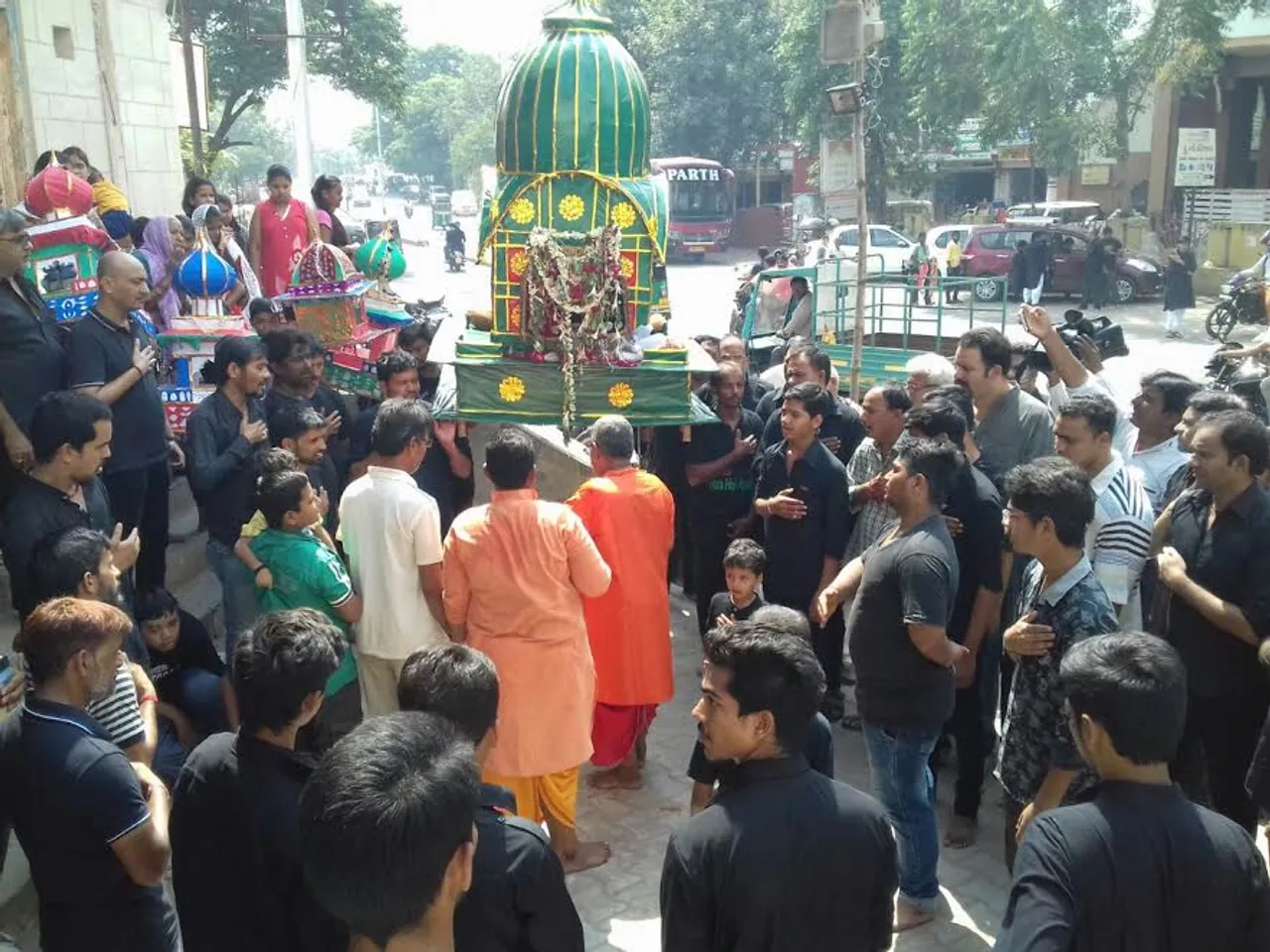 Tazia cool down by temple priest in Vadodara