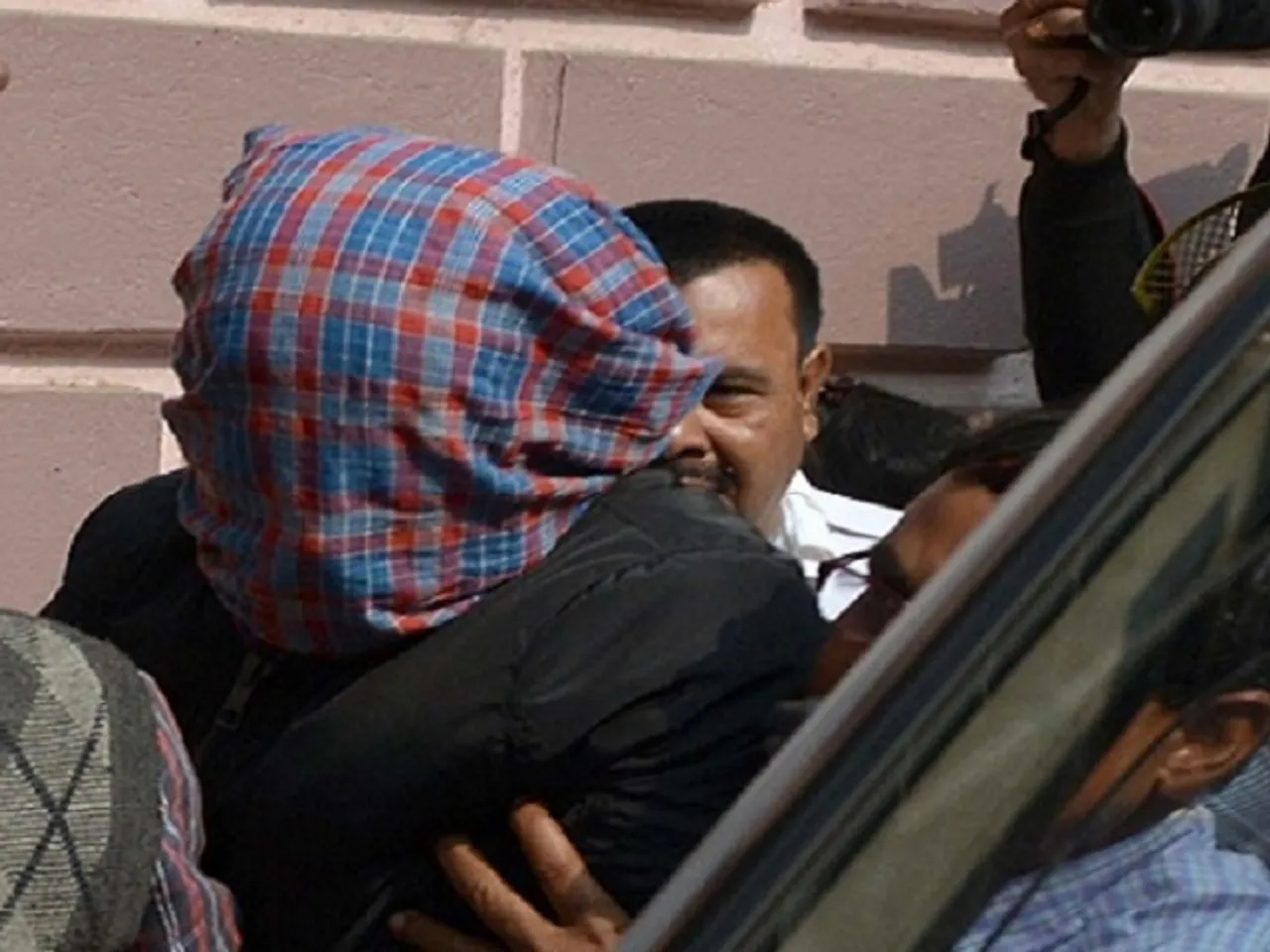 11 arrested for beating up police, woman