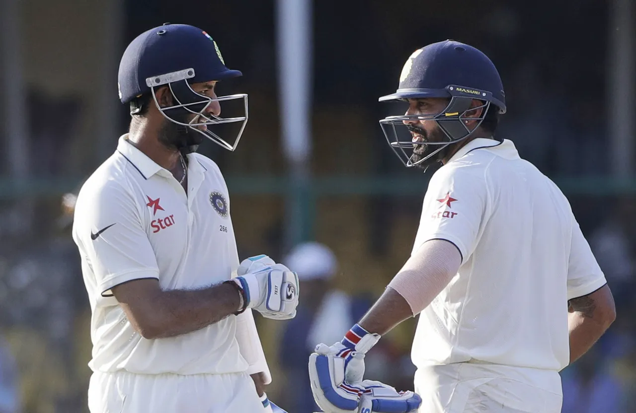 Vijay, Pujara lead India reply