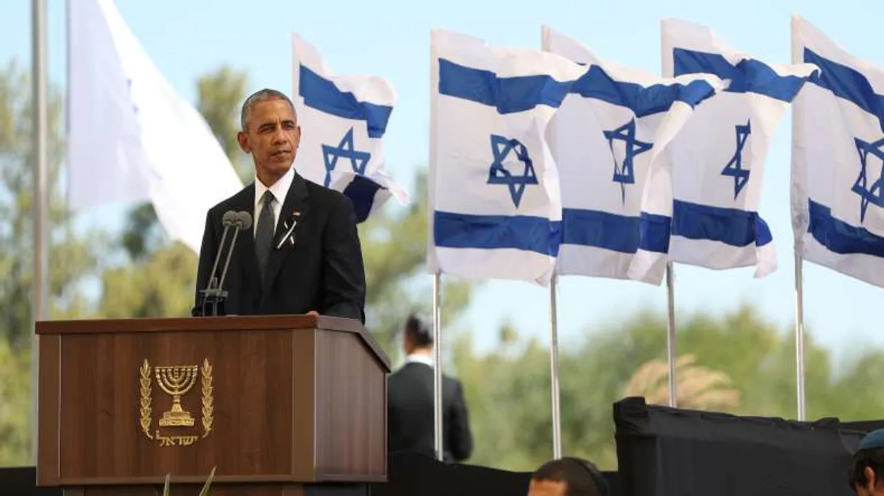 Obama urges voters to move history in the right direction
