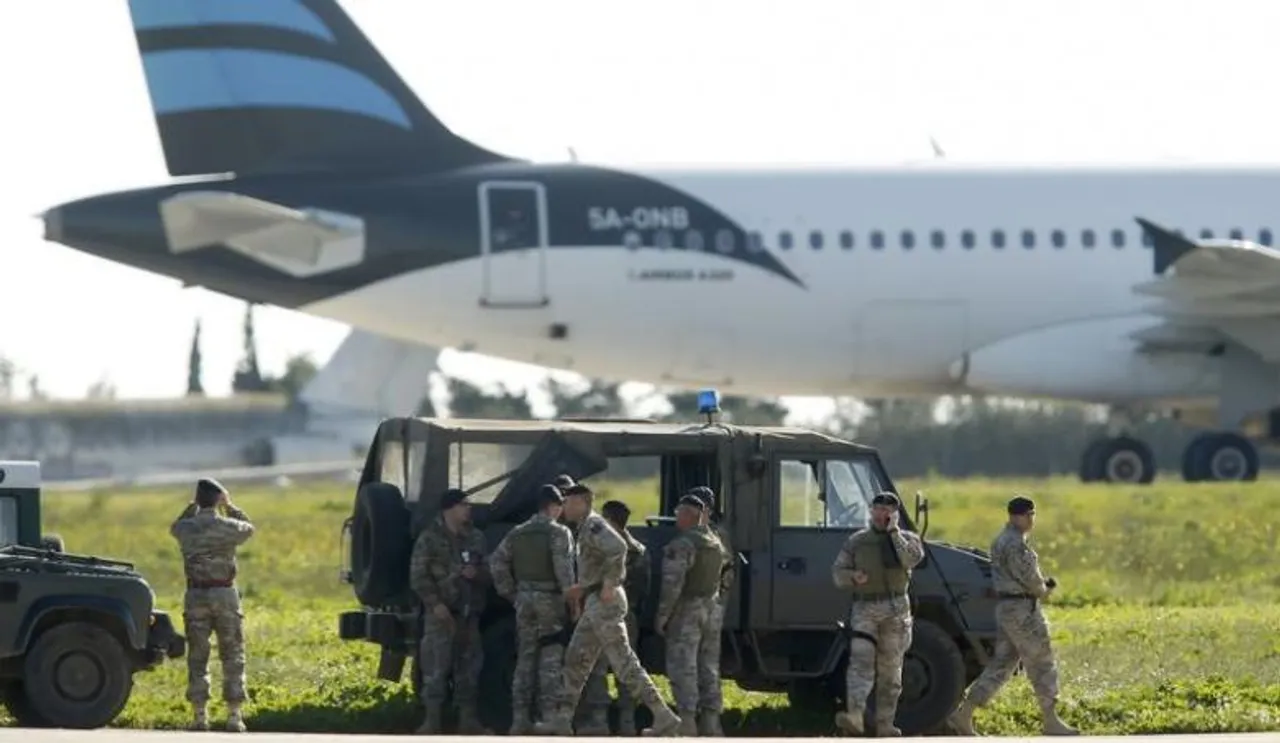 Hijacked Libyan jet lands in Malta, 118 people on board