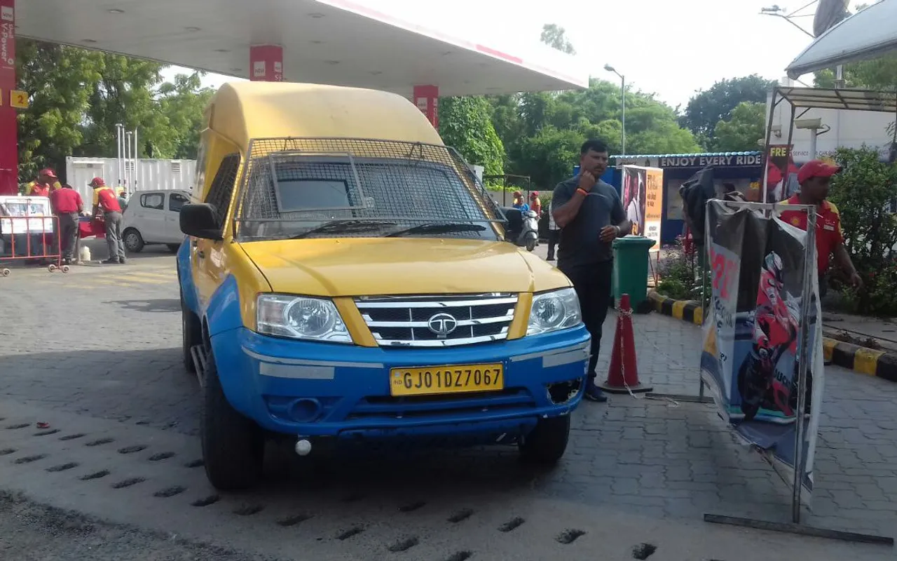 Two youths fled with cash kept inside cash collection van in broad Daylight