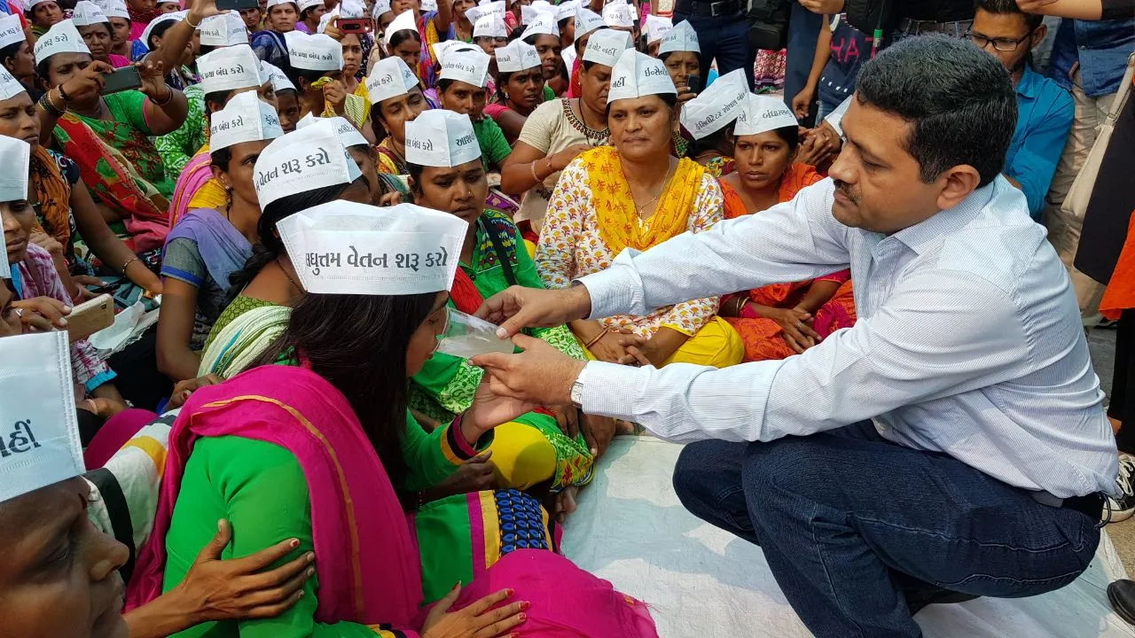 Asha workers sat on strike along with their children