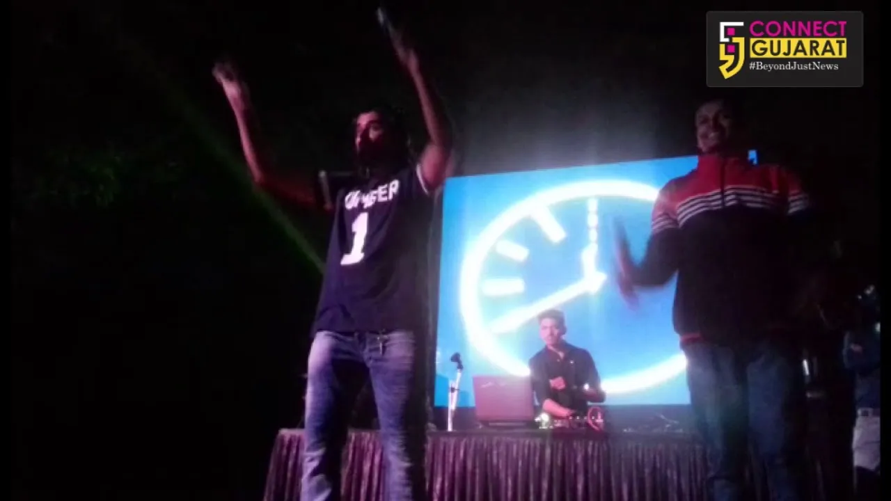 People dance to the tunes of Gujarati Garba on New year eve