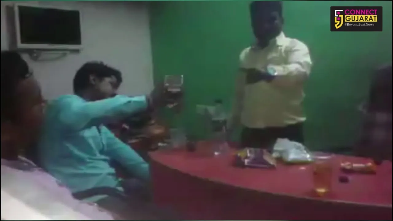 Viral Video of youths enjoying liquor party with BJP flag