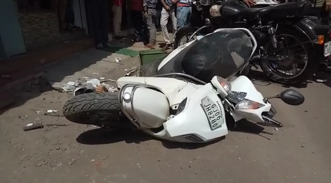 Wife of hotel owner knocked down a two wheeler injuring the rider