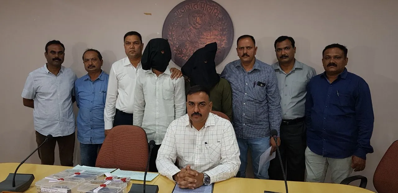 Vadodara police arrested two cousin brothers in connection with firing on a builder