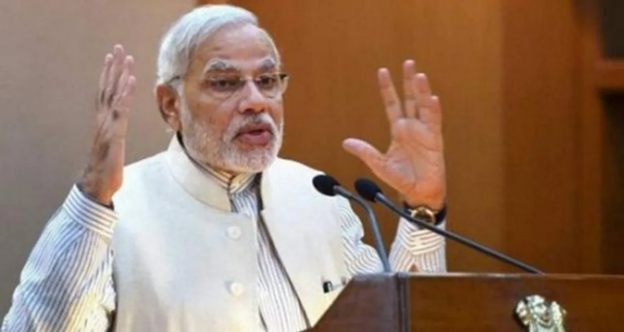 Modi blasts opposition for 'dividing' the country