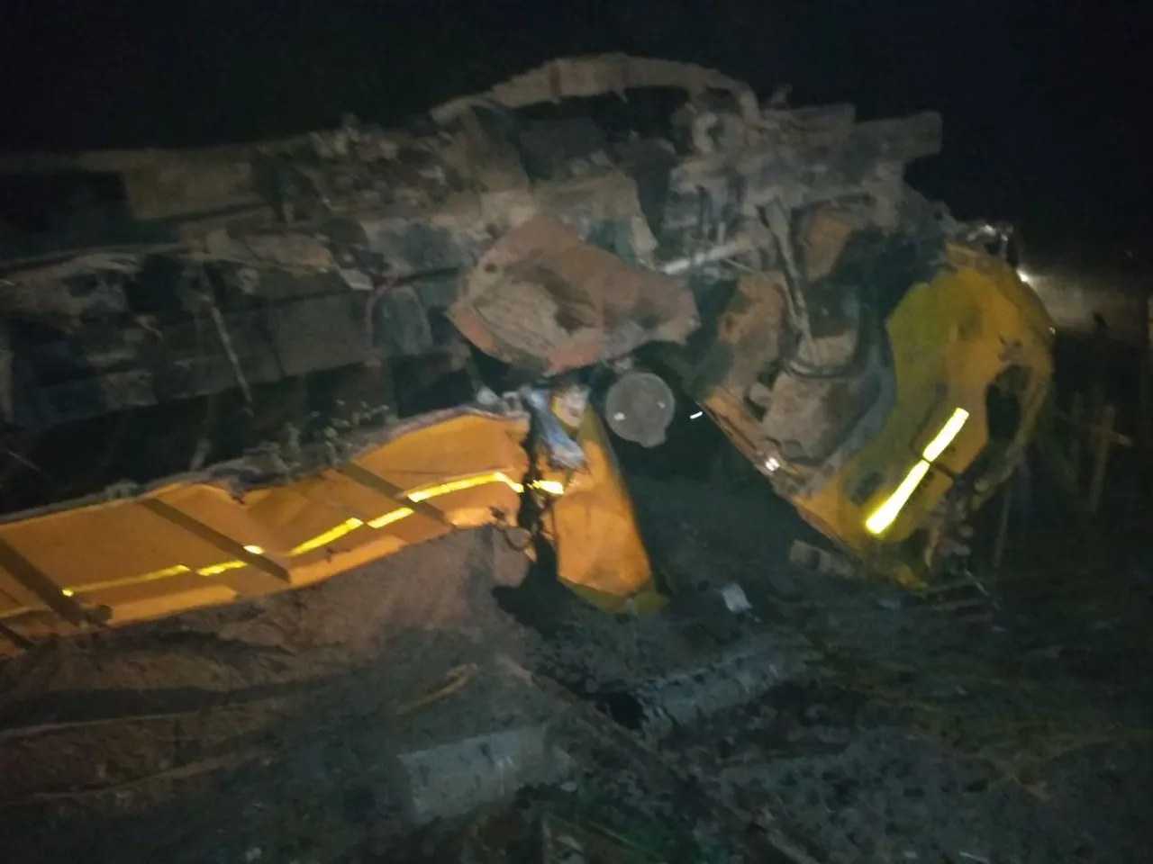 Sand laden truck turned turtle on railway crossing near Palaswada village in Dabhoi